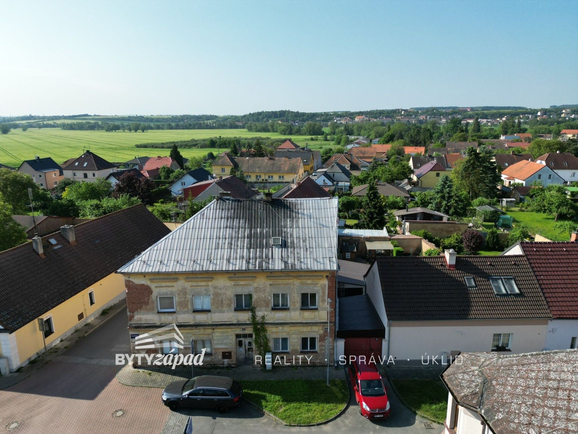 Prodej dům - Vlkýšská, Město Touškov, 664 m²