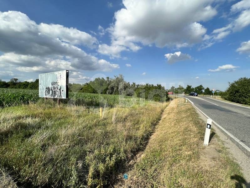 Prodej komerční pozemek - Masarykova, Rajhrad